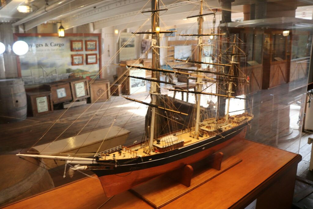 a model of a ship on display in a museum